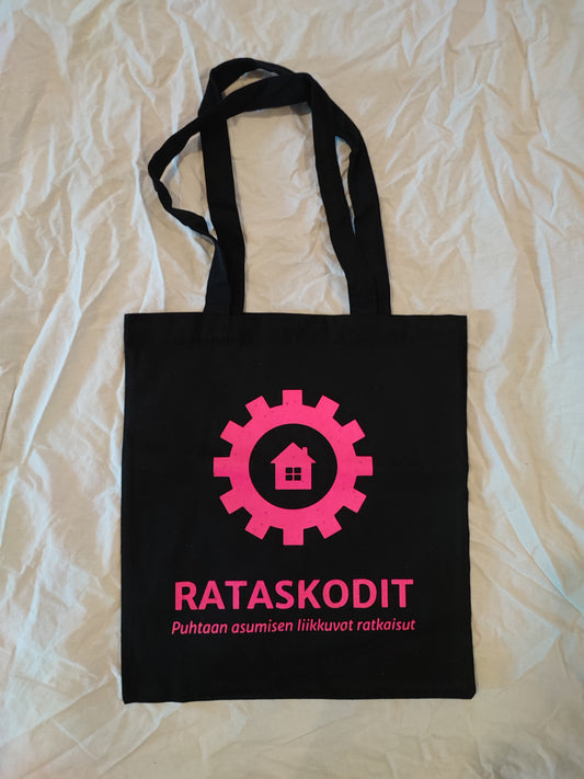 Rataskotien musta kassi pinkillä painetulla logolla