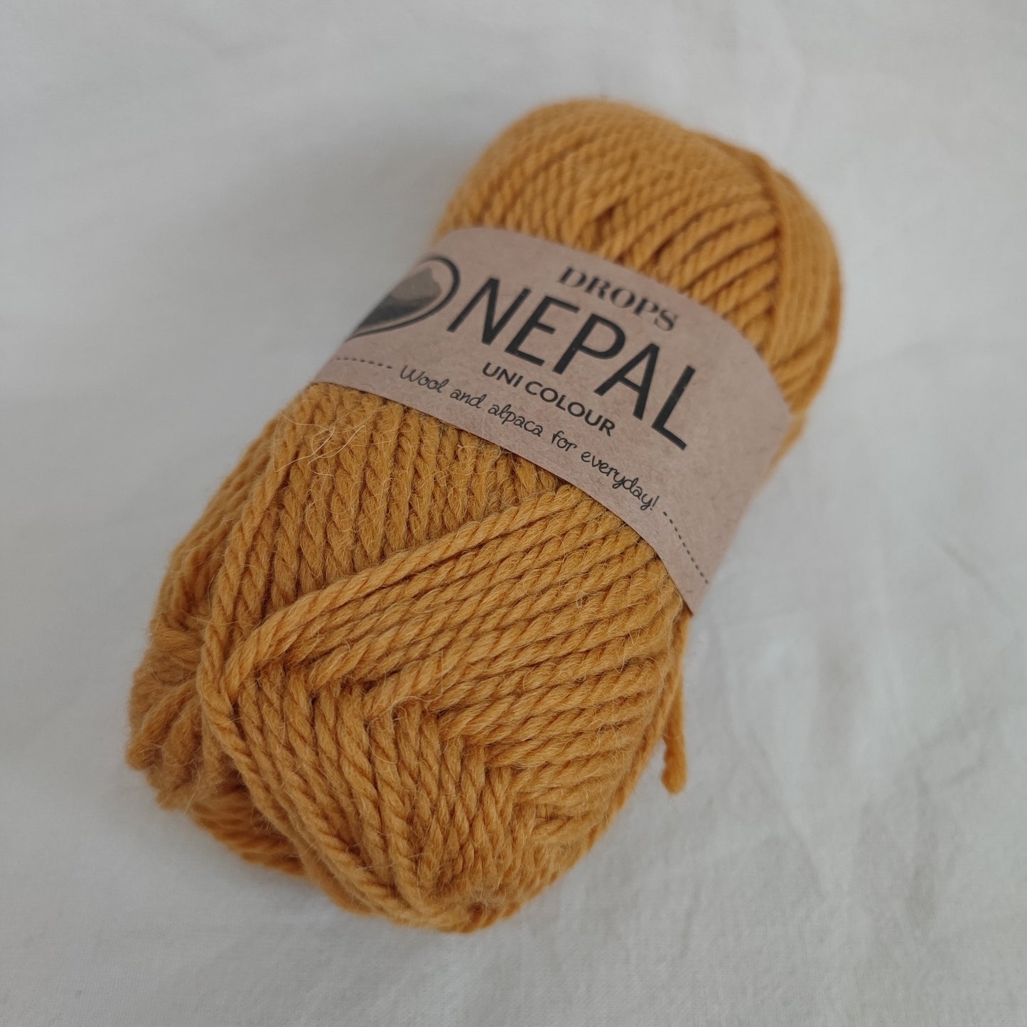 ENNAKKOTILATTAVISSA Drops Nepal -villalanka, Okra (punamulta), 2923