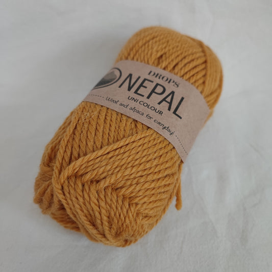 ENNAKKOTILATTAVISSA Drops Nepal -villalanka, Okra (punamulta), 2923