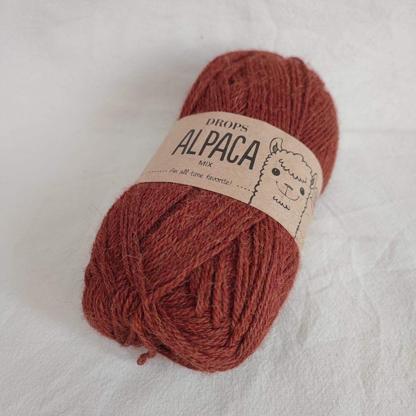 ENNAKKOTILATTAVISSA DROPS Alpaca Mix, Hasselpähkinä, 9025