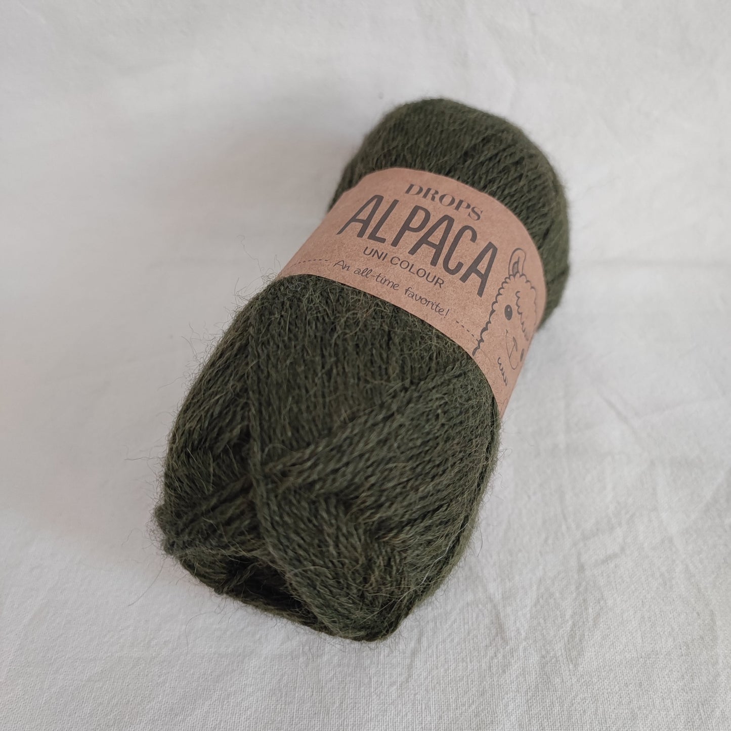 ENNAKKOTILATTAVISSA Drops Alpaca, Armeijanvihreä, 7895